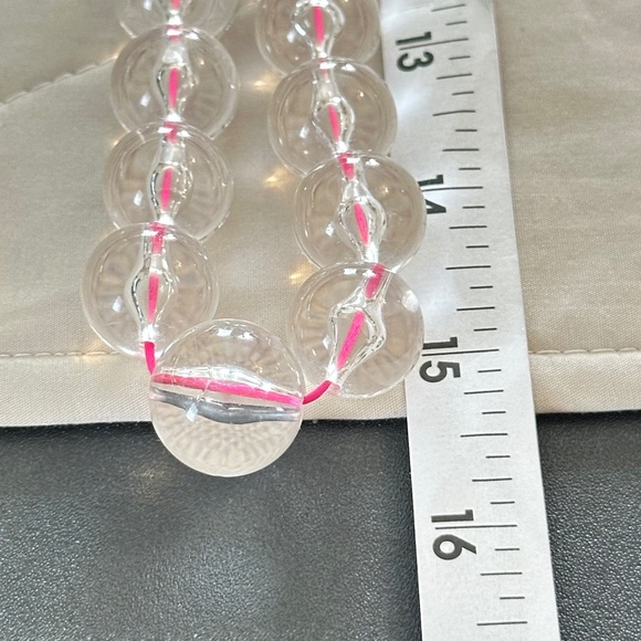 Graduating clear glass bead necklace strung on hot pink string. Lobster clasp - Picture 7 of 13